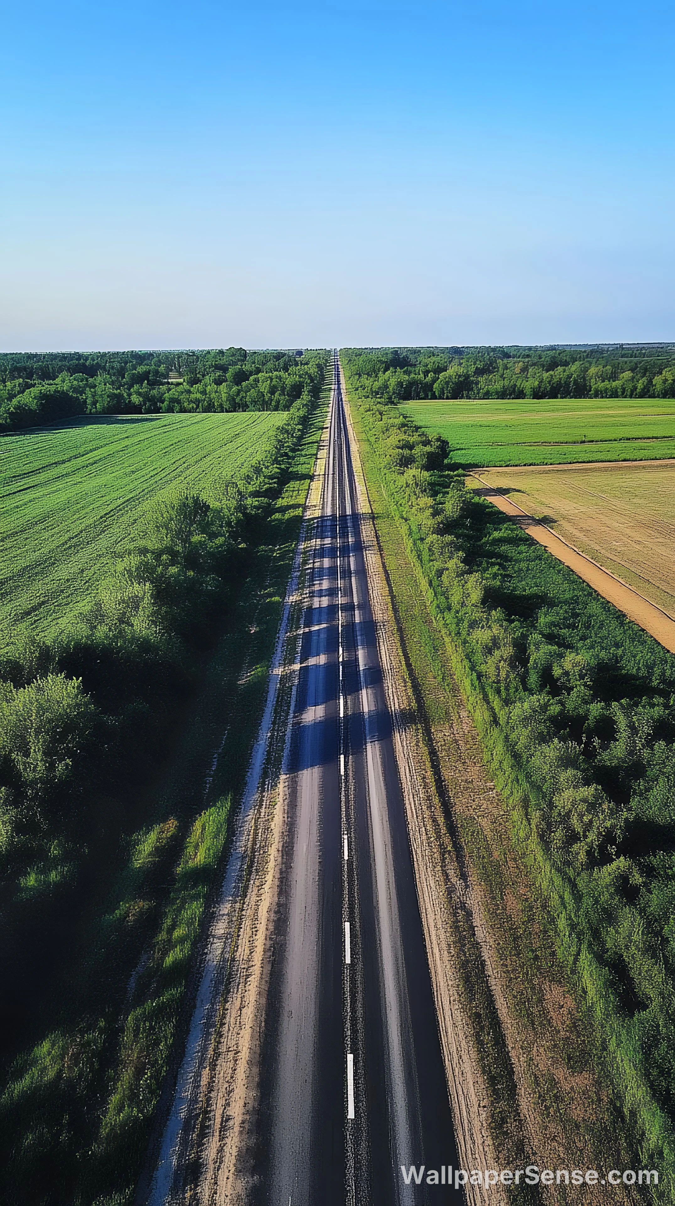 Minimalistní venkovská silnice 8K Ultra HD mobilní pozadí