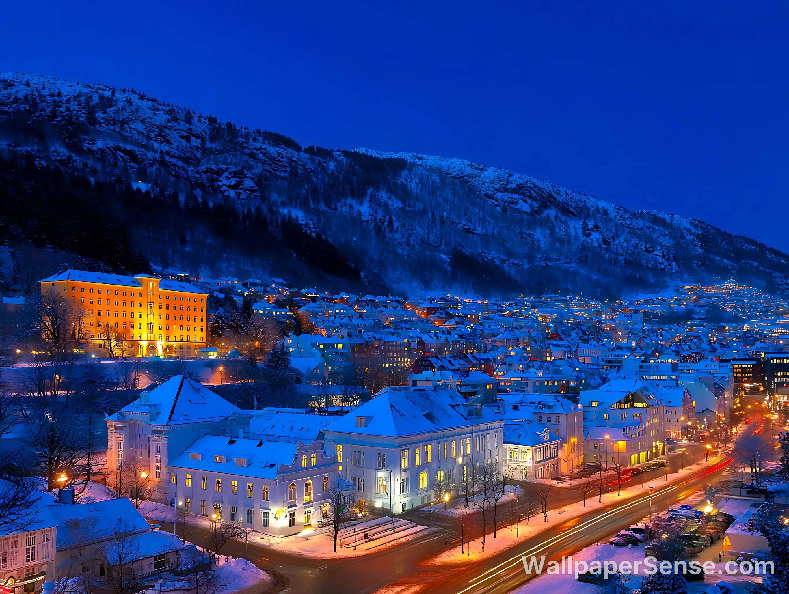 Paysage nocturne d'un village alpin autrichien 4K fond d'écran
