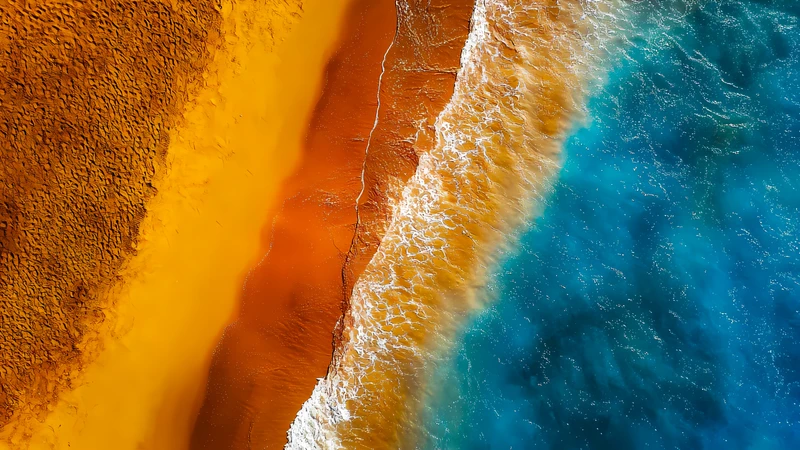 Aerial Ocean Waves Meeting Sandy Shore 4K Desktop Wallpaper